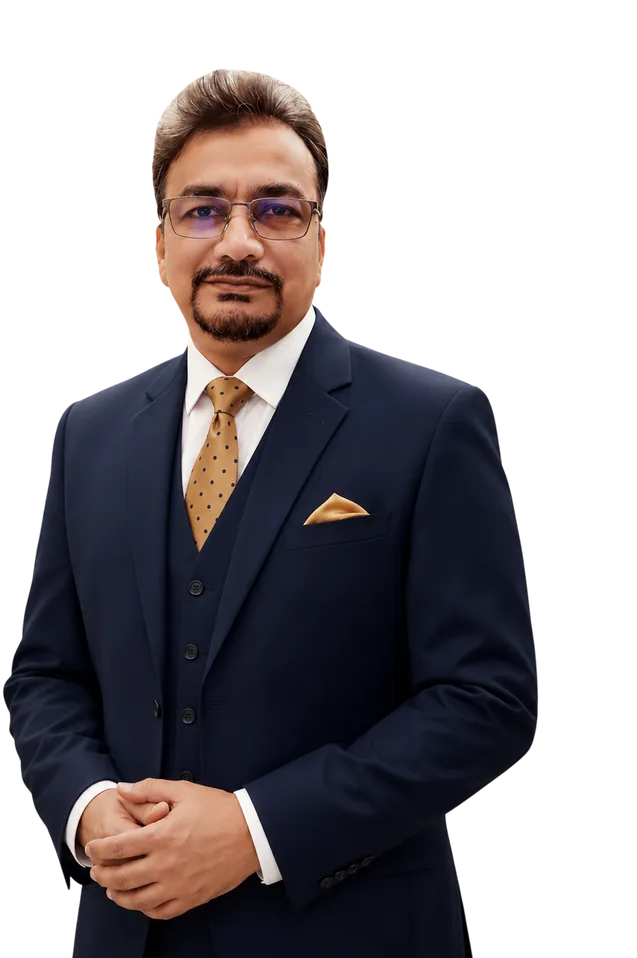 Portrait of Dr. Ghulam Mohey-ud-din standing, hands clasped